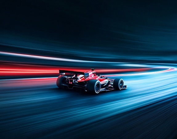Race car driving on a racetrack